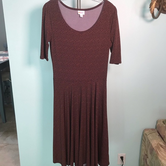 LuLaRoe Dresses & Skirts - Lularoe Nicole Navy with yellow red print casual M